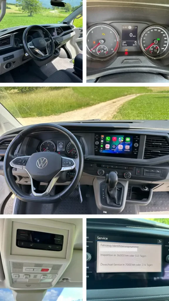 Modernes Fahrerhaus eines Volkswagen Campervans mit Lenkrad, Infotainmentsystem und Serviceanzeige.